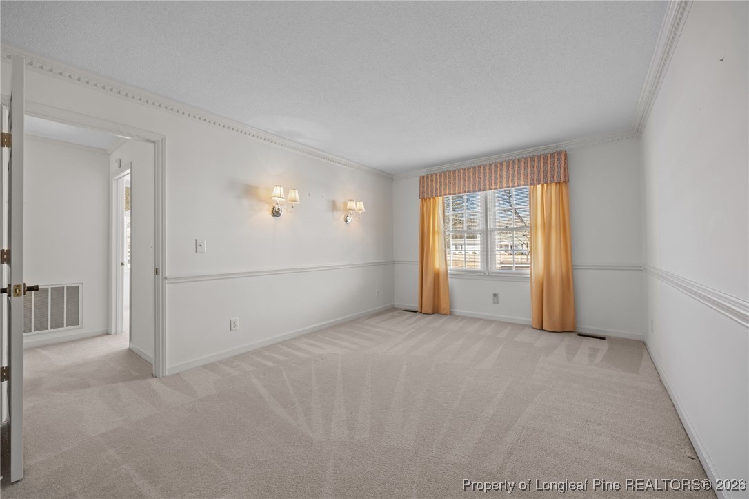 4943 Highway 301 Benson, NC 27504 - Photo 25 of 49 an empty room with windows and closet