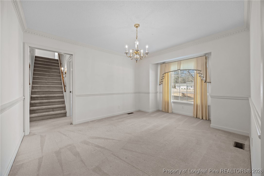 4943 Highway 301 Benson, NC 27504 - Photo 30 of 49 a view of an empty room with a window