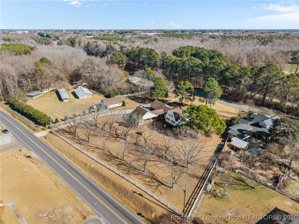 4943 Highway 301 Benson, NC 27504 - Photo 40 of 49 a view of a outdoor space with a lake view