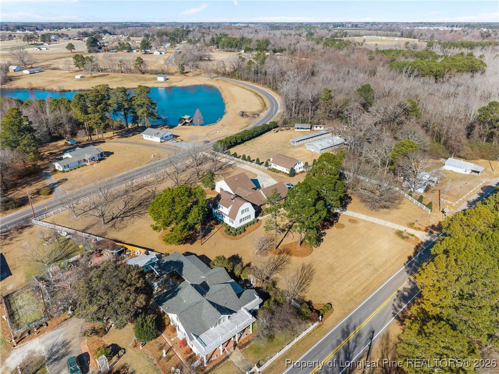 4943 Highway 301 Benson, NC 27504 - Photo 41 of 49 an aerial view of a house with a swimming pool