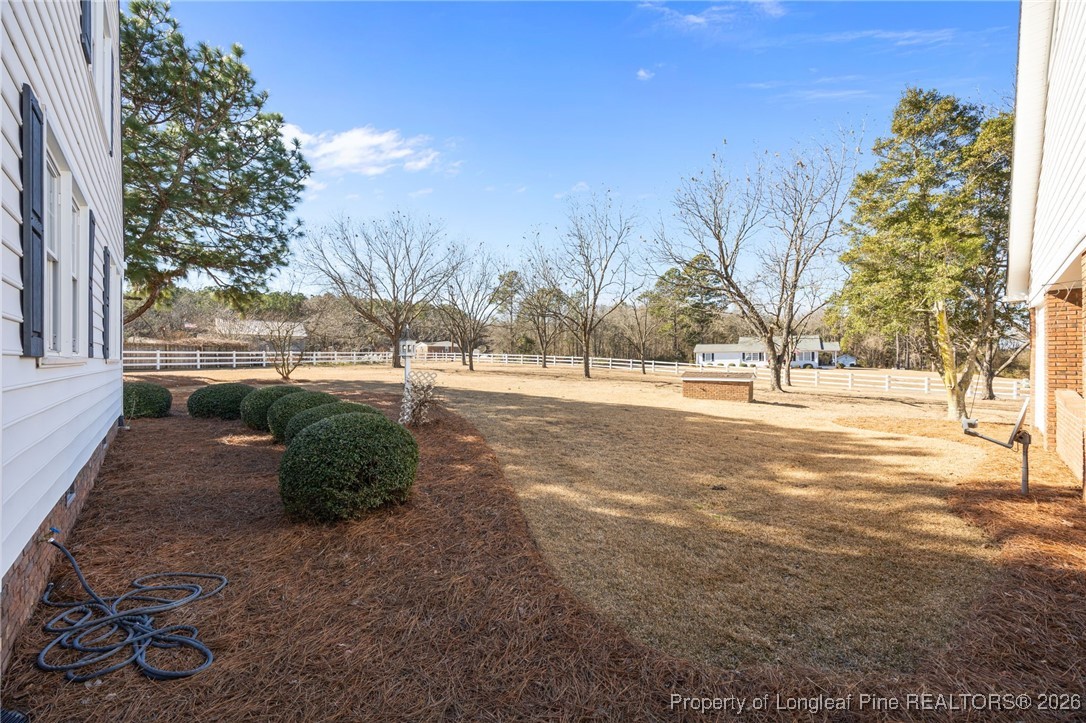 4943 Highway 301 Benson, NC 27504 - Photo 49 of 49 a view of road with large trees