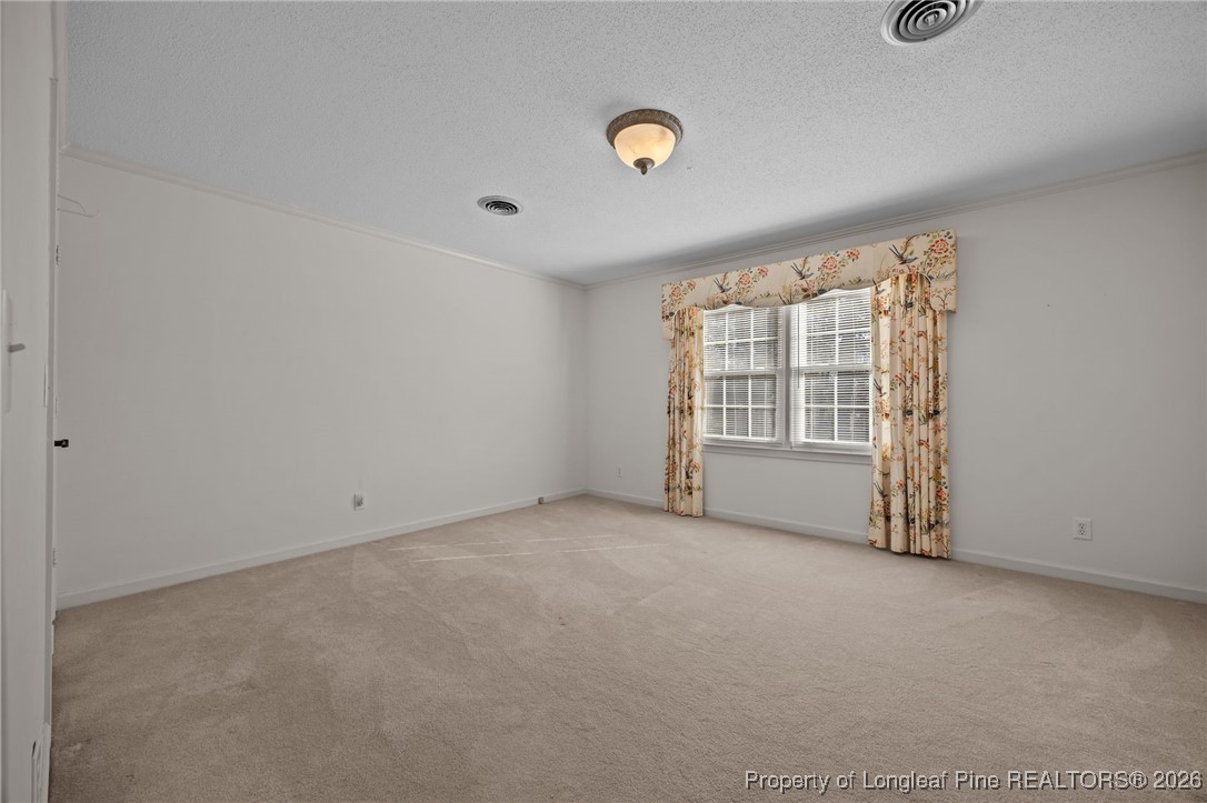 4943 Highway 301 Benson, NC 27504 - Photo 10 of 49 an empty room with windows