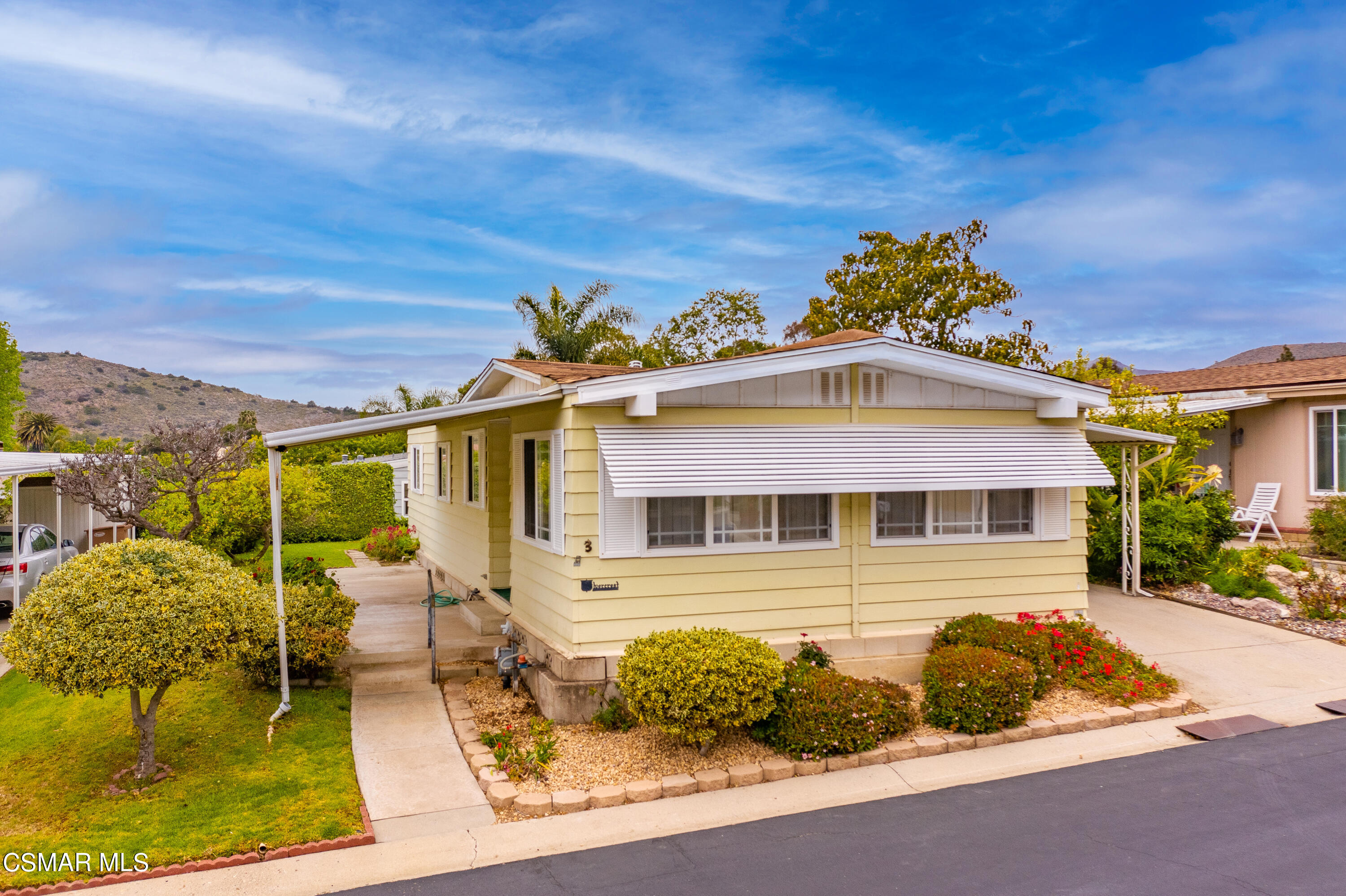 3 Gitana Avenue, Unit 151 Camarillo, CA 93012 - Photo 3 of 12 front view of a house with a outdoor space