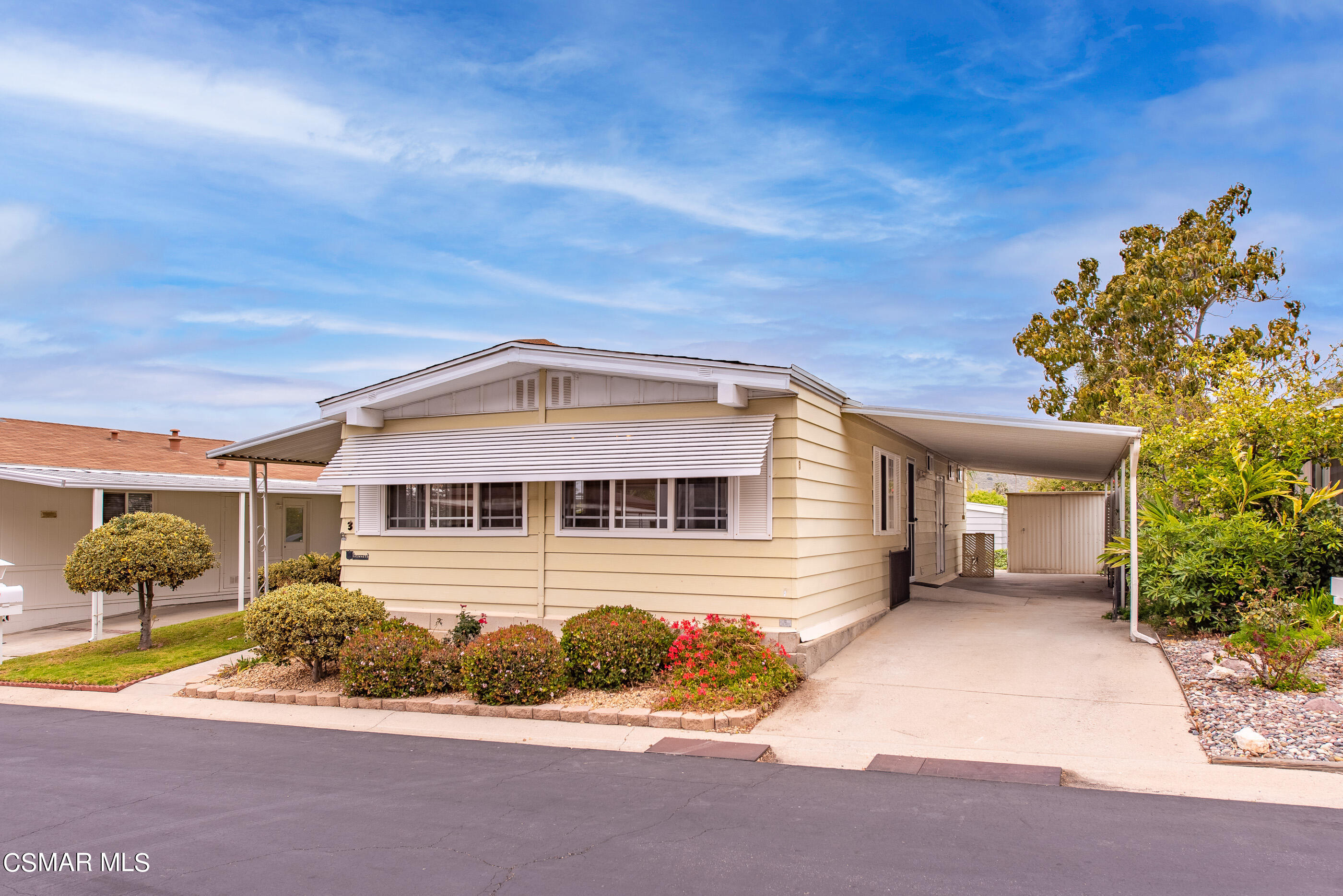 3 Gitana Avenue, Unit 151 Camarillo, CA 93012 - Photo 7 of 12 front view of a house with a yard