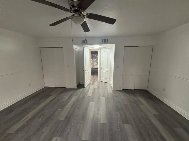 a bathroom with a toilet a sink and bathtub