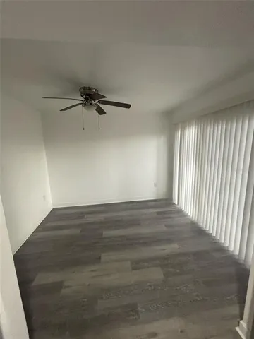 a kitchen with a refrigerator sink and stove