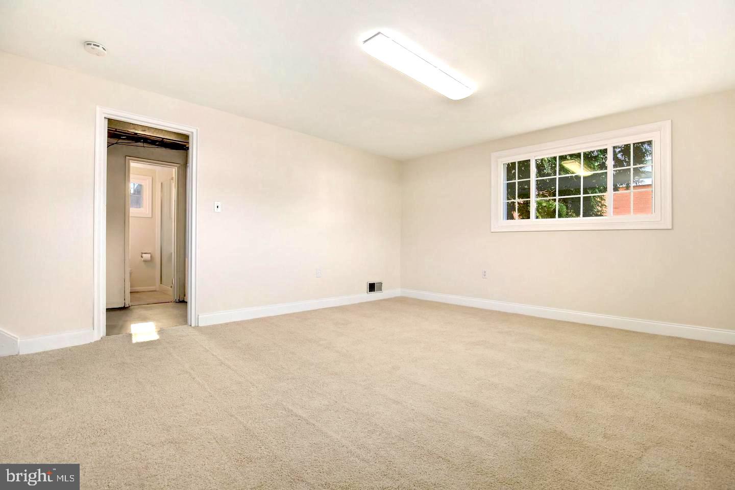 3514 May Street Silver Spring, MD 20906 - Photo 21 of 33 a view of an empty room with a window