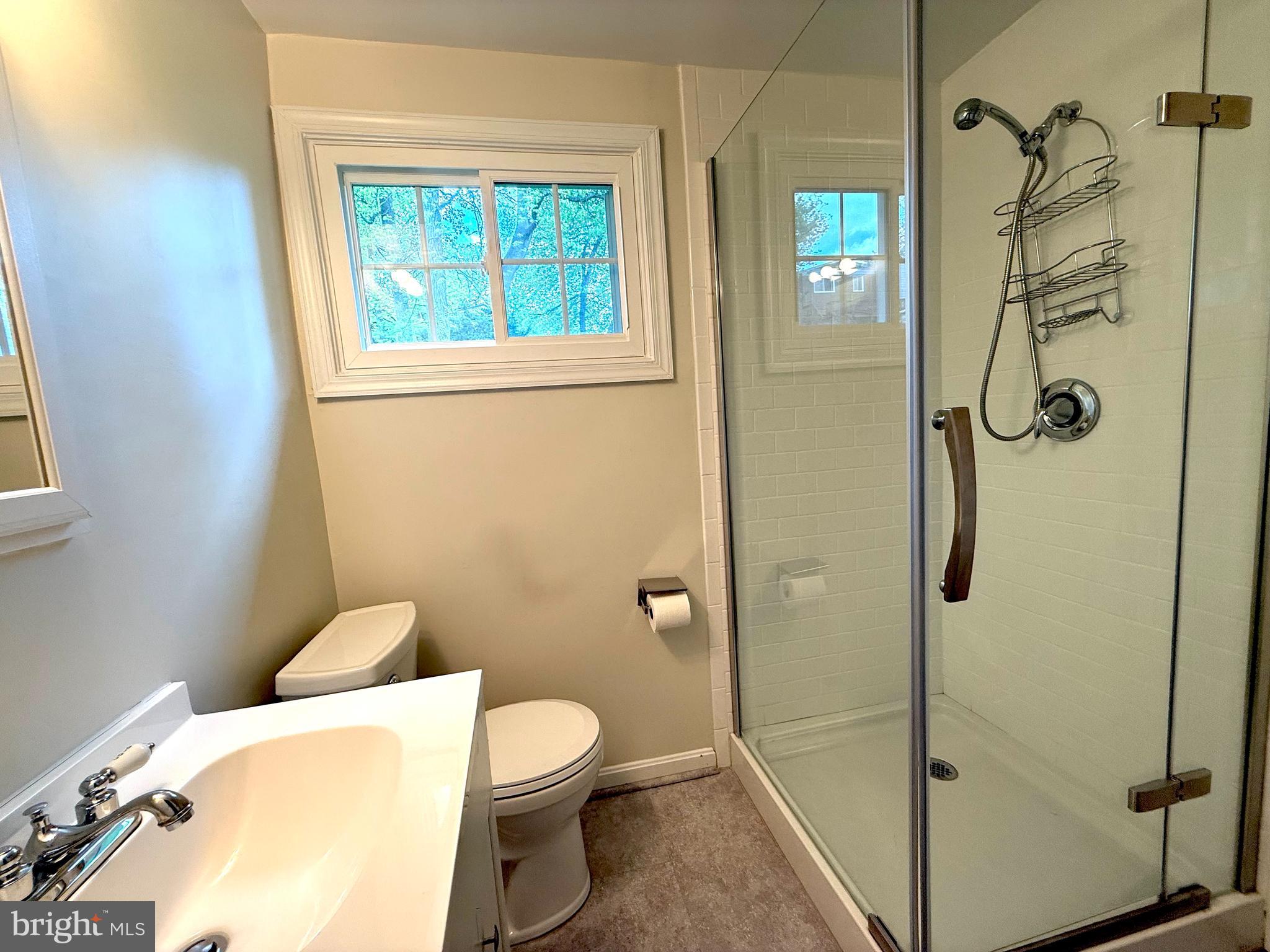 3514 May Street Silver Spring, MD 20906 - Photo 23 of 33 a bathroom with a toilet and shower