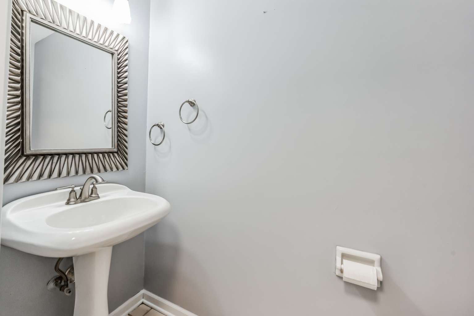 1113 Stonegate Court Bartlett, IL 60103 - Photo 11 of 25 a bathroom with a sink a mirror and shower curtain