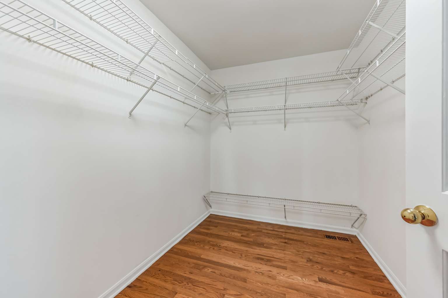 1113 Stonegate Court Bartlett, IL 60103 - Photo 15 of 25 a view of a room with racks on the wall