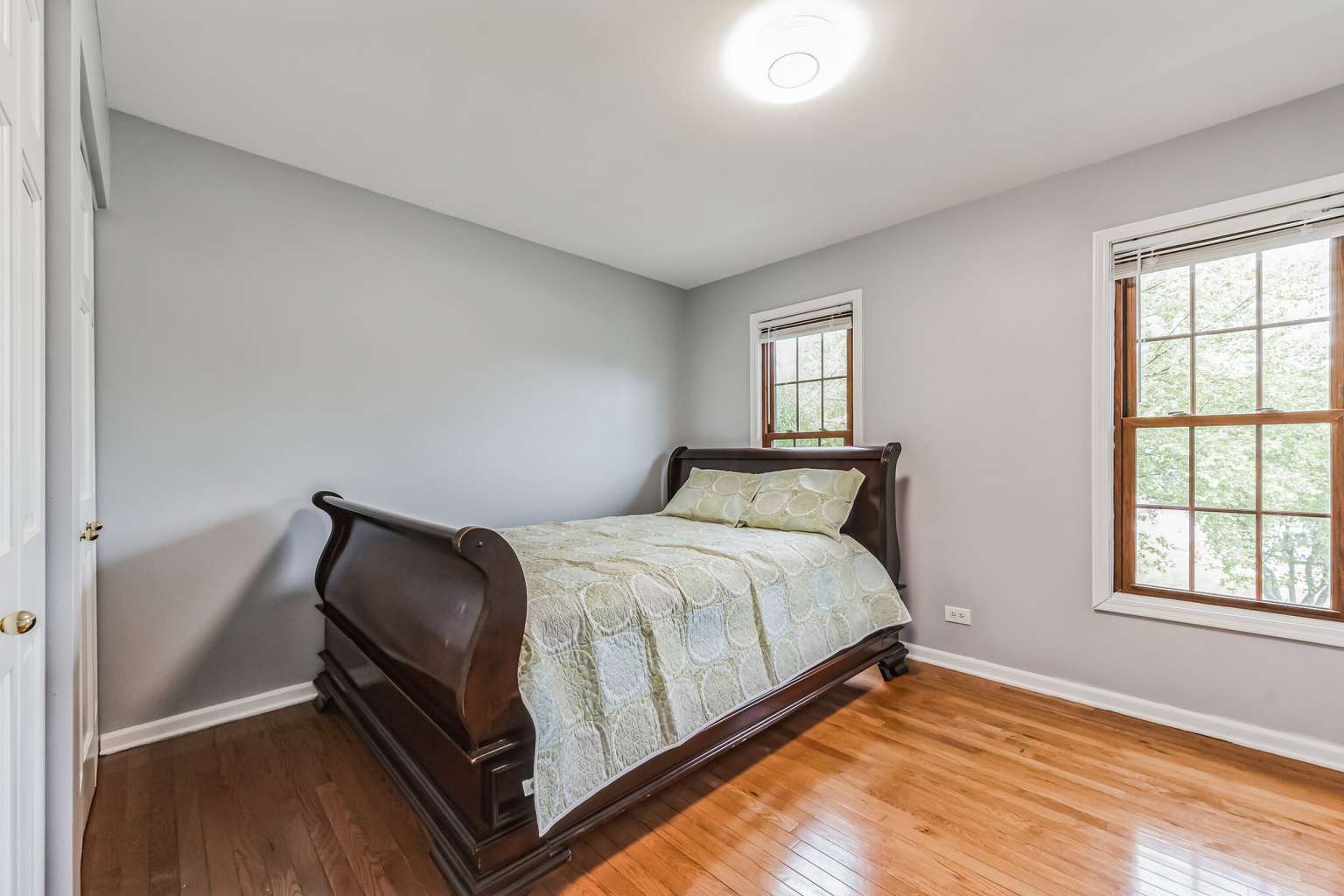 1113 Stonegate Court Bartlett, IL 60103 - Photo 19 of 25 a bedroom with a bed and window