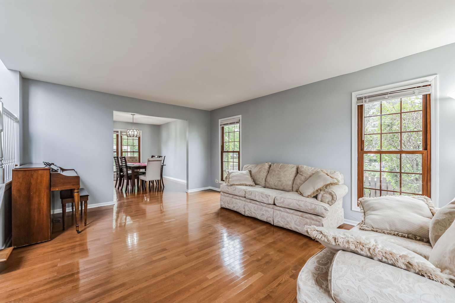 1113 Stonegate Court Bartlett, IL 60103 - Photo 5 of 25 a living room with furniture and wooden floor