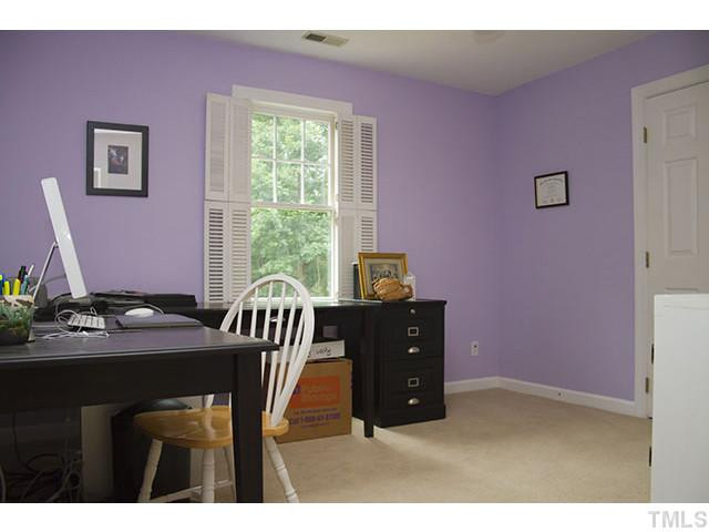 21 Swallows Ridge Court Durham, NC 27713 - Photo 11 of 25 a view of a dining room with furniture and a window