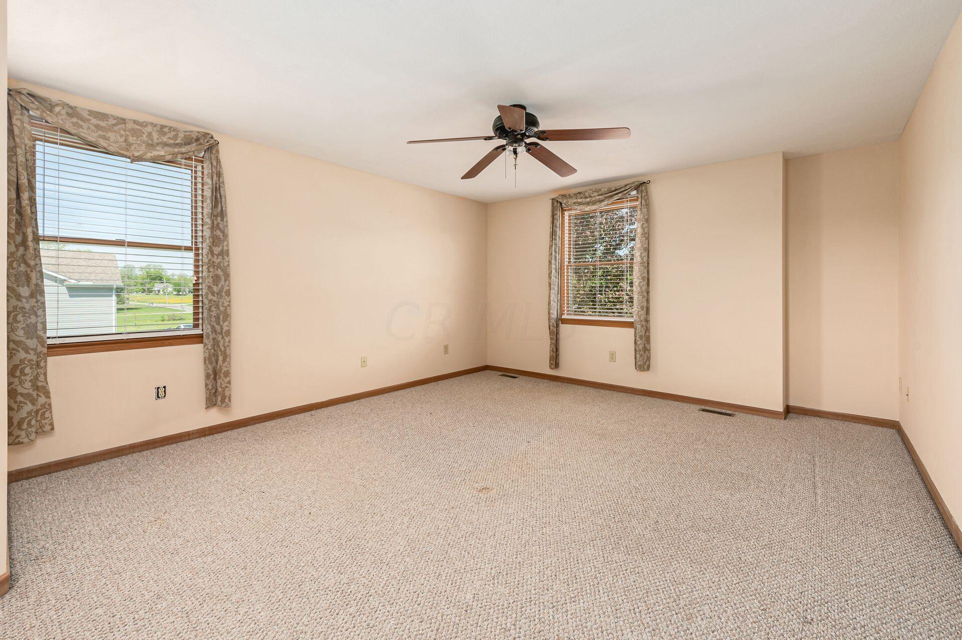 5789 Blacks Road Southwest Pataskala, OH 43062 - Photo 25 of 60 Primary Suite