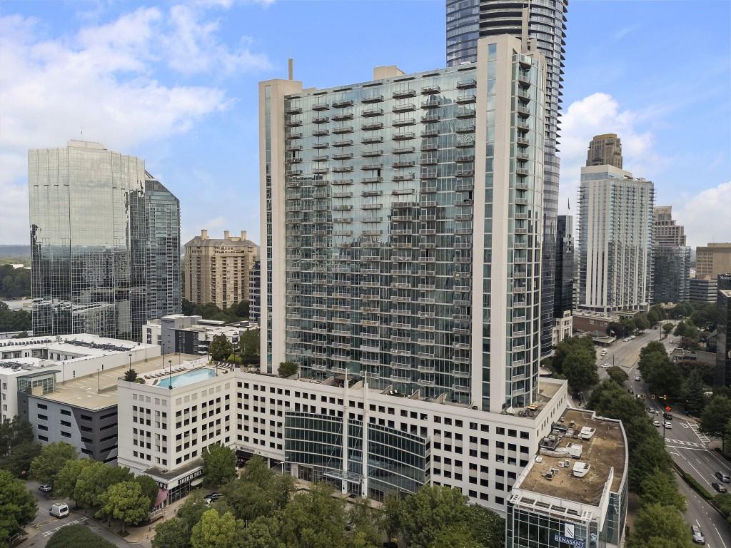 a view of a city with tall buildings