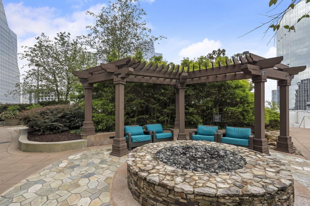 3324 Peachtree Road Northeast, Unit 2918 Atlanta, GA 30326 - Photo 24 of 27 a view of a porch with furniture and yard