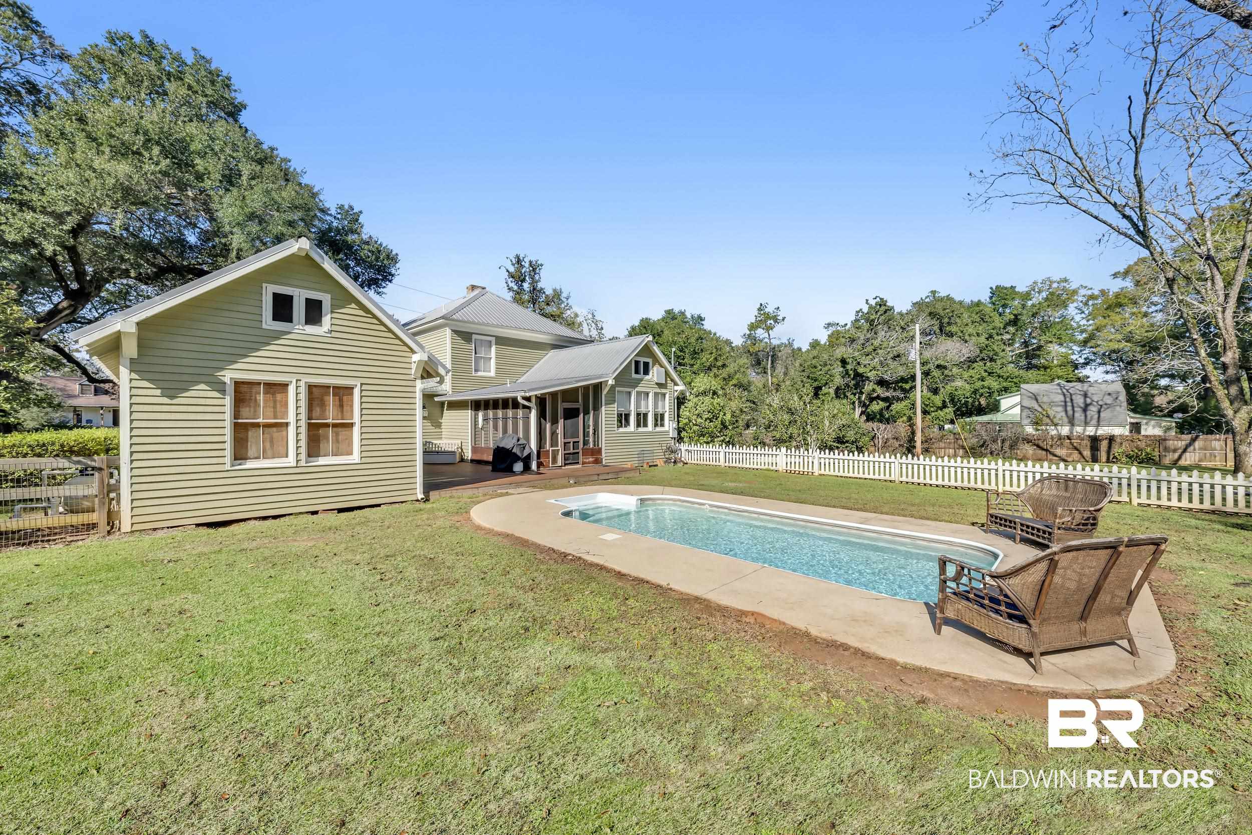 13232 Mary Ann Bch Road Fairhope, AL 36532 - Photo 59 of 79 Rear view of property with a fenced backyard and a patio