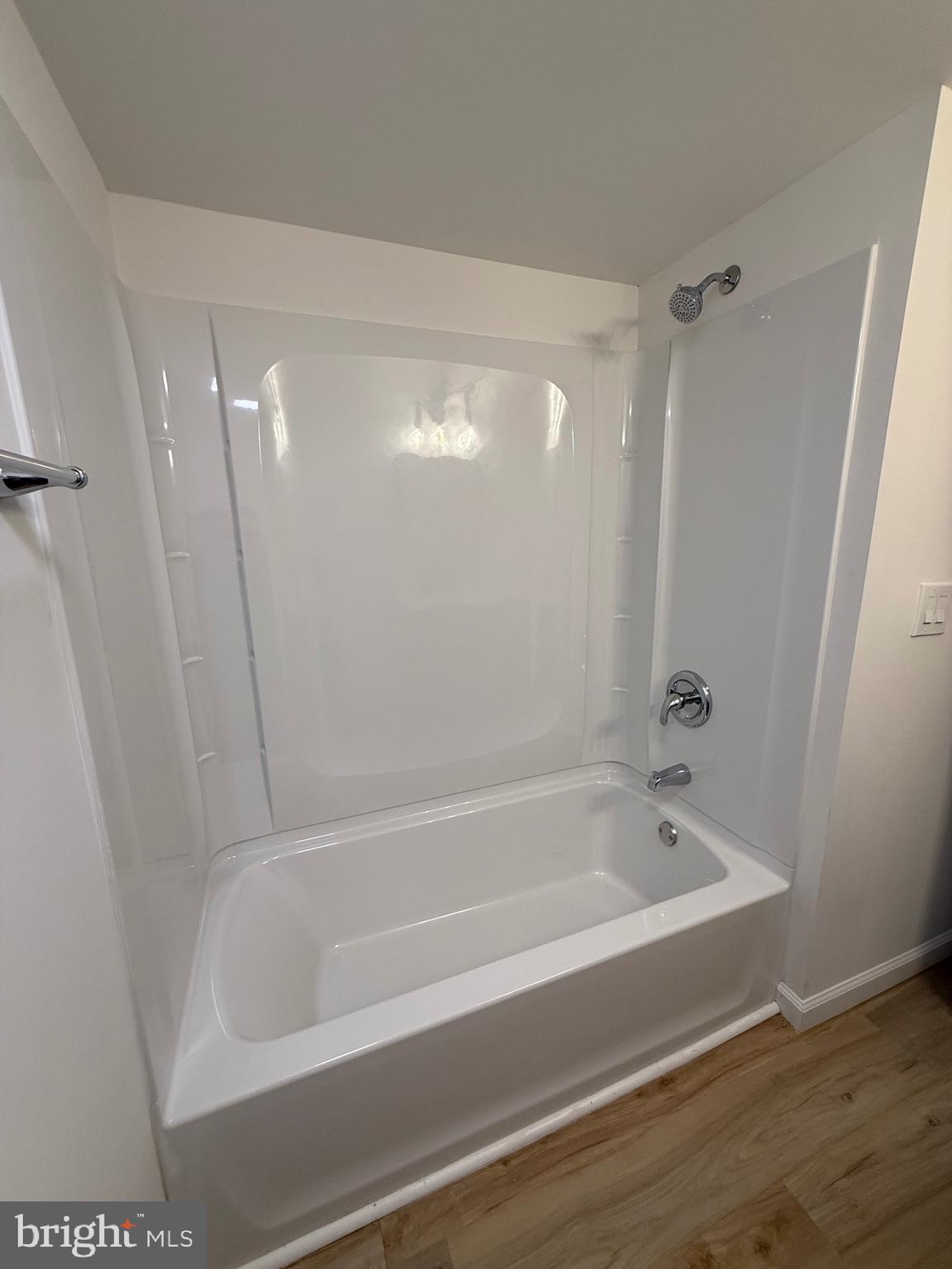 65 Springhill Road Mantua, NJ 08051 - Photo 5 of 10 a bathroom with a bathtub and a shower