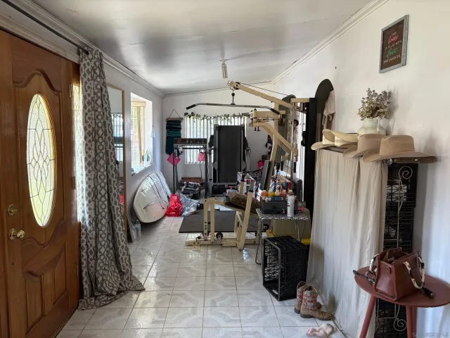 a living room with furniture window and wooden floor