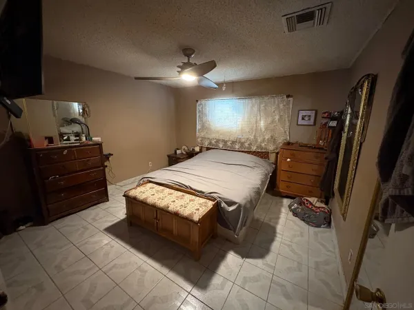 a bathroom with a sink vanity and mirror