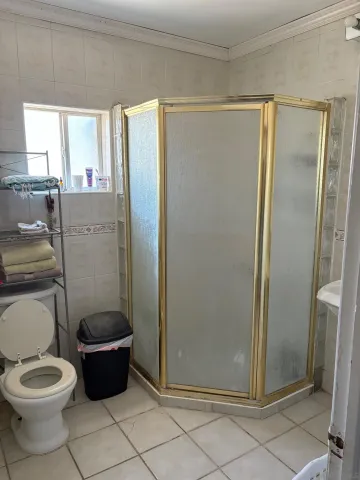 a bathroom with a toilet and a sink