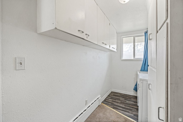 149 West 1600th Street South Mapleton, UT 84664 - Photo 29 of 44 Laundry room featuring a baseboard radiator, washer / clothes dryer, and dark carpet