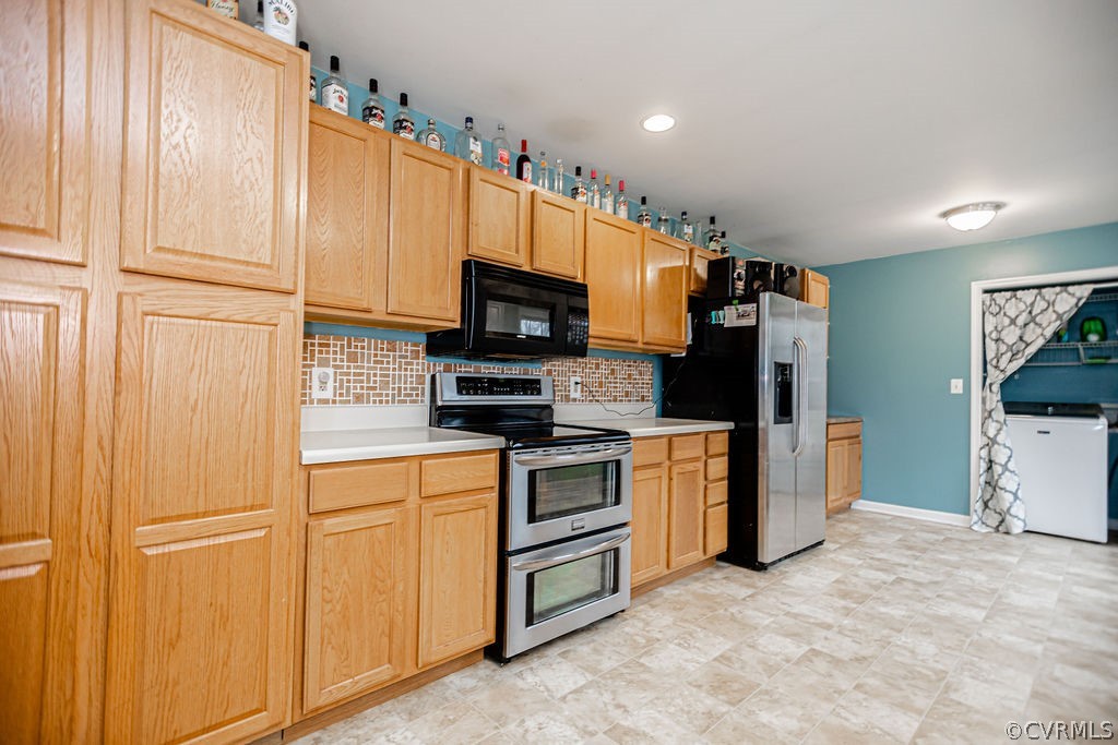 1595 Scuffletown Road Rice, VA 23966 - Photo 12 of 49 a kitchen with stainless steel appliances a refrigerator a stove a sink and a microwave