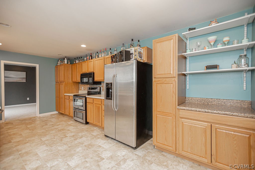 1595 Scuffletown Road Rice, VA 23966 - Photo 13 of 49 a kitchen with stainless steel appliances a refrigerator and a stove top oven
