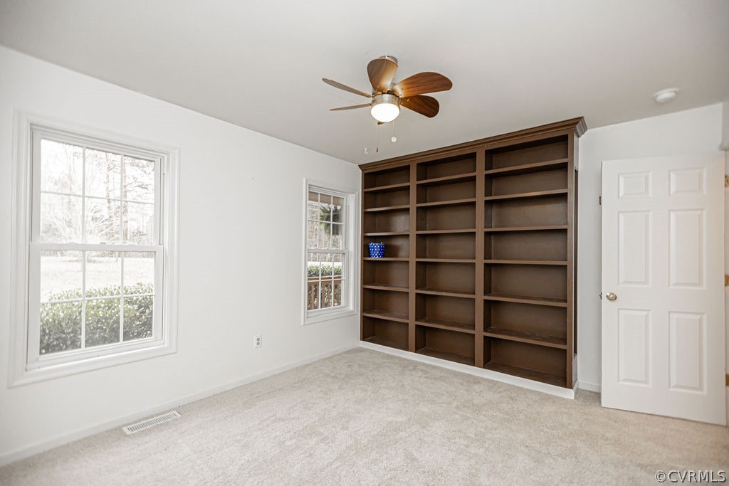 1595 Scuffletown Road Rice, VA 23966 - Photo 27 of 49 a view of an empty room with a window and a chandelier