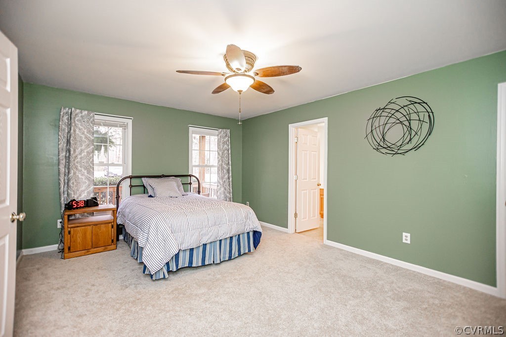 1595 Scuffletown Road Rice, VA 23966 - Photo 31 of 49 a bedroom with a bed and a chandelier
