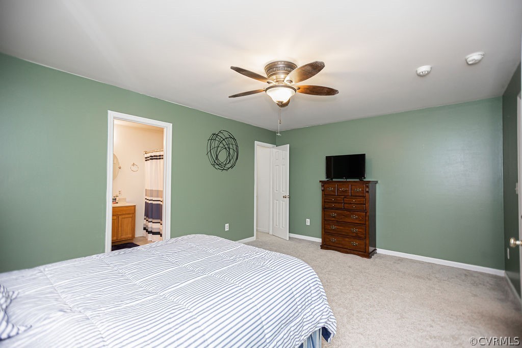 1595 Scuffletown Road Rice, VA 23966 - Photo 32 of 49 a bedroom with a bed and a chandelier