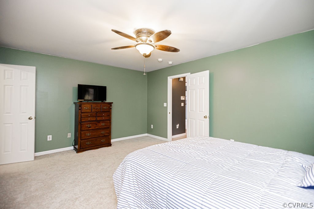 1595 Scuffletown Road Rice, VA 23966 - Photo 33 of 49 a bedroom with a bed and a flat screen tv