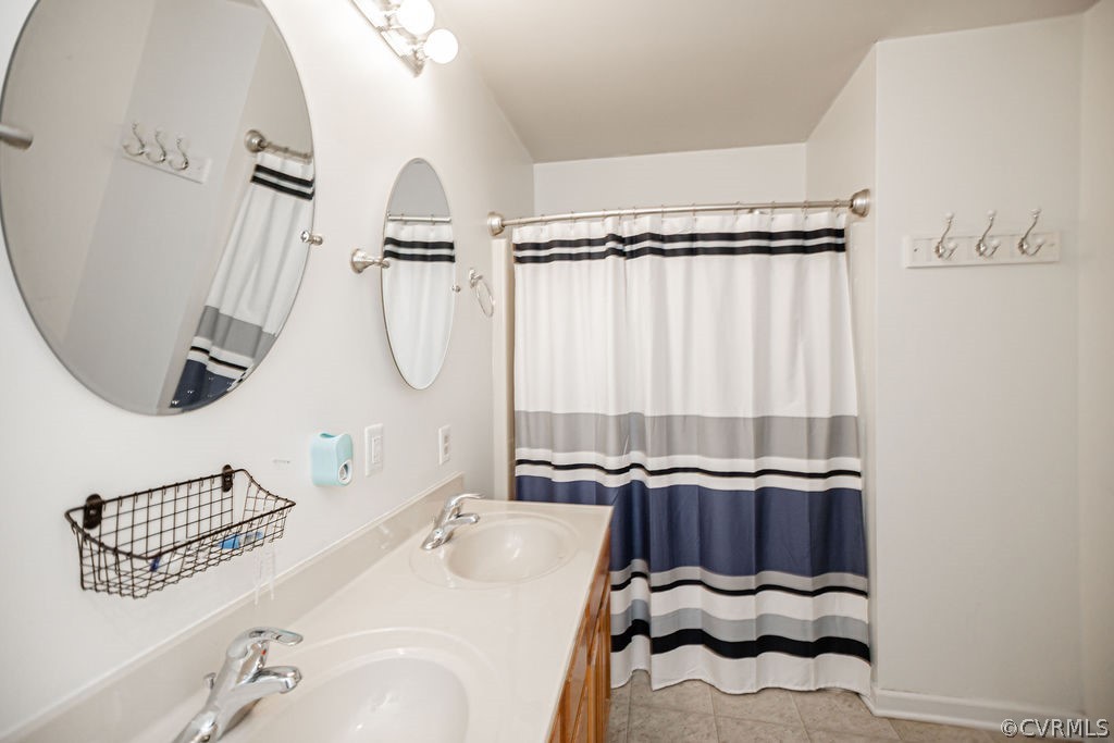 1595 Scuffletown Road Rice, VA 23966 - Photo 35 of 49 a bathroom with a sink and a mirror