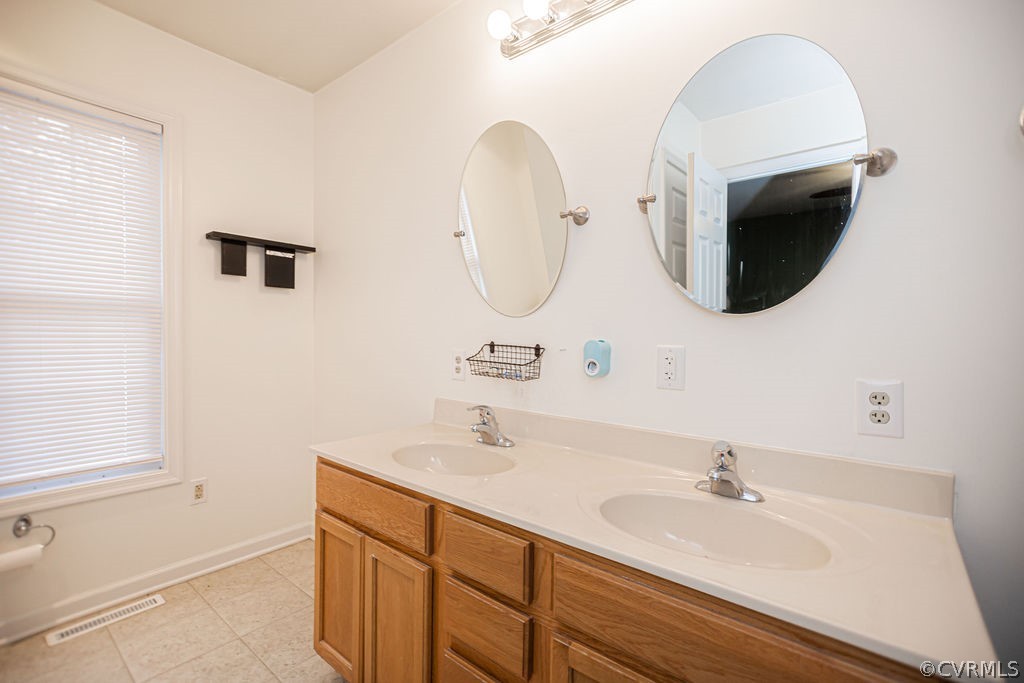 1595 Scuffletown Road Rice, VA 23966 - Photo 37 of 49 a bathroom with a sink and a mirror