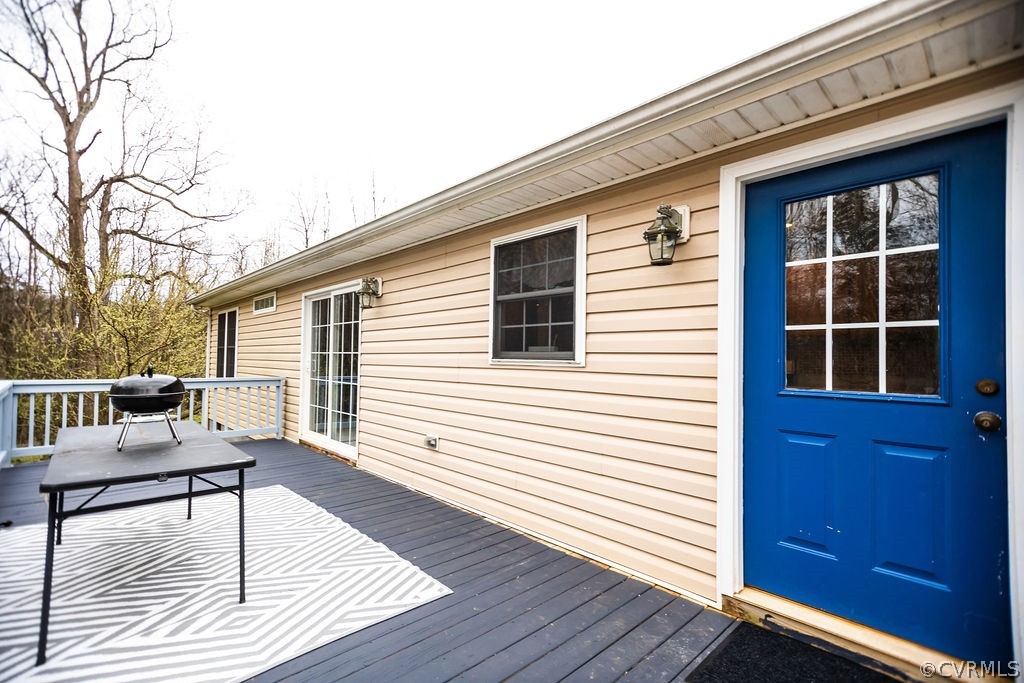 1595 Scuffletown Road Rice, VA 23966 - Photo 40 of 49 a view of deck with chairs and wooden floor