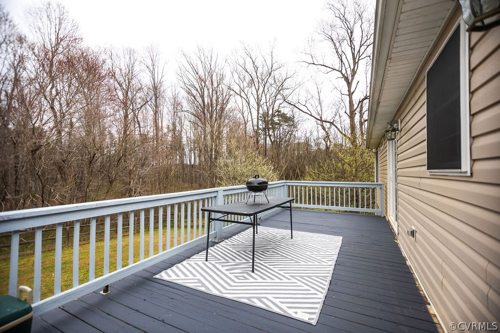 1595 Scuffletown Road Rice, VA 23966 - Photo 41 of 49 a balcony with wooden floor and wooden floor