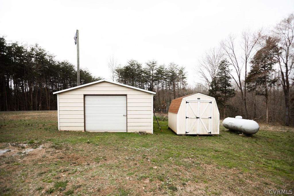 1595 Scuffletown Road Rice, VA 23966 - Photo 48 of 49 a view of a tiny house with a yard and large tree