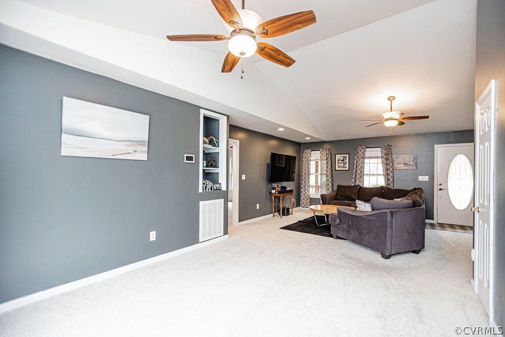 1595 Scuffletown Road Rice, VA 23966 - Photo 9 of 49 a living room with furniture and a flat screen tv