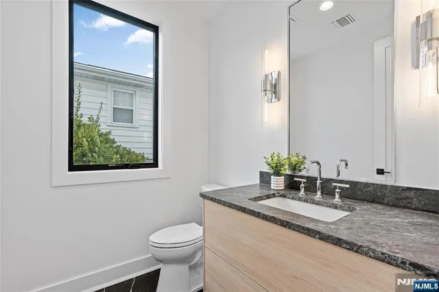 a bathroom with a tub and shower