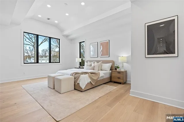 a bathroom with a double vanity sink mirror and double
