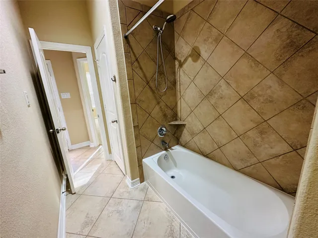 a view of a house with backyard and porch