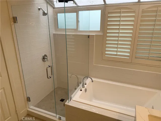 an empty room with wooden floor