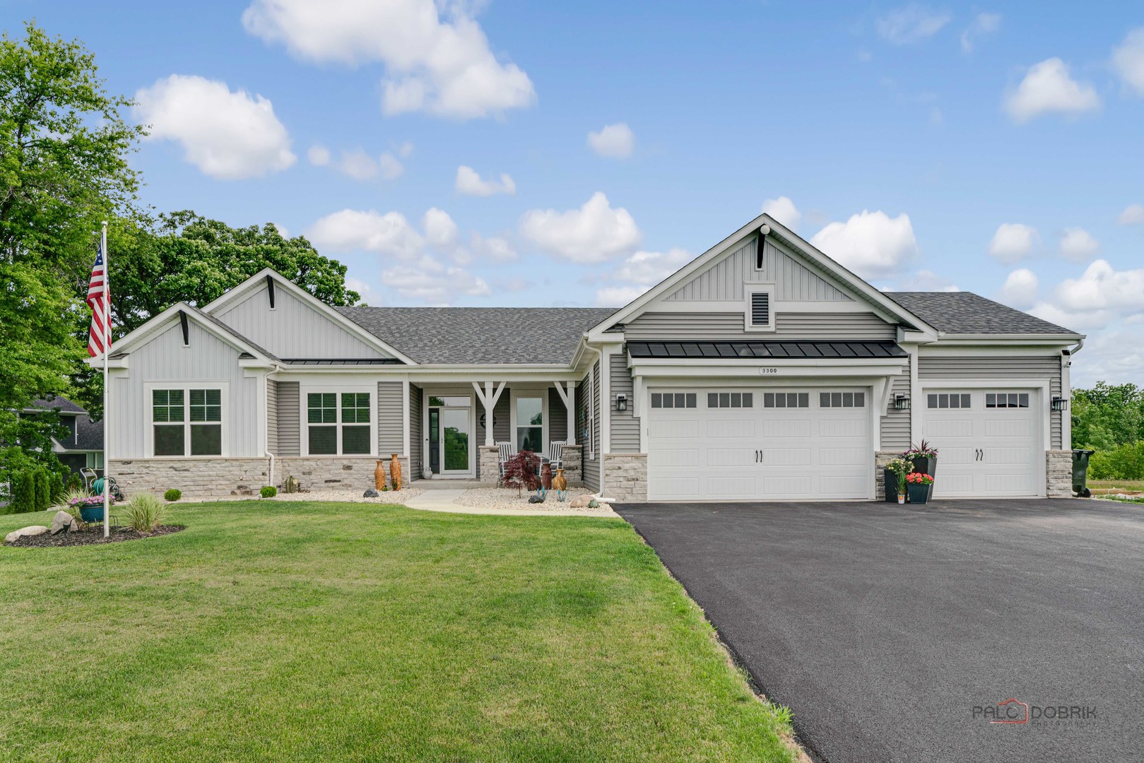 3300 Cornflower Way Spring Grove, IL 60081 - Photo 1 of 34 a front view of a house with a yard