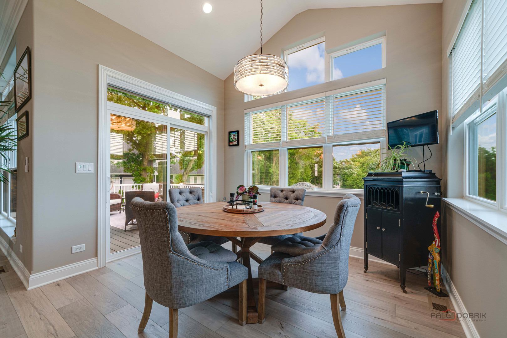3300 Cornflower Way Spring Grove, IL 60081 - Photo 13 of 34 a view of a dining room with furniture window and wooden floor