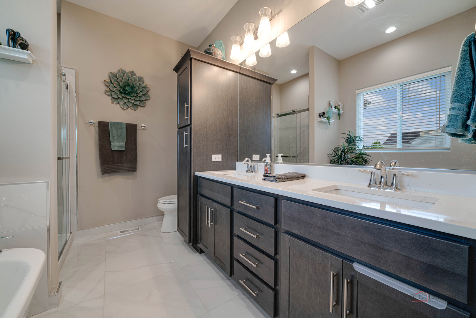3300 Cornflower Way Spring Grove, IL 60081 - Photo 17 of 34 a bathroom with a double vanity sink a mirror and a shower