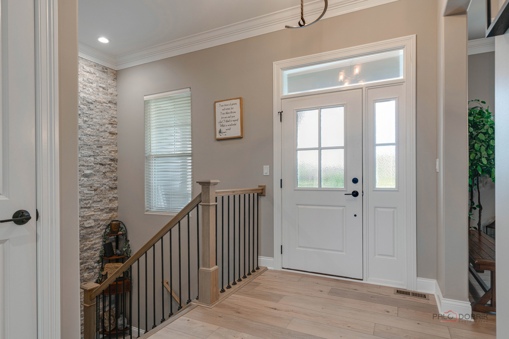 3300 Cornflower Way Spring Grove, IL 60081 - Photo 3 of 34 a view of a hallway with windows and stairs
