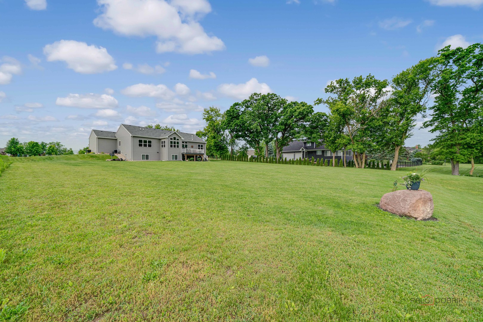 3300 Cornflower Way Spring Grove, IL 60081 - Photo 34 of 34 a backyard of a house with lots of green space