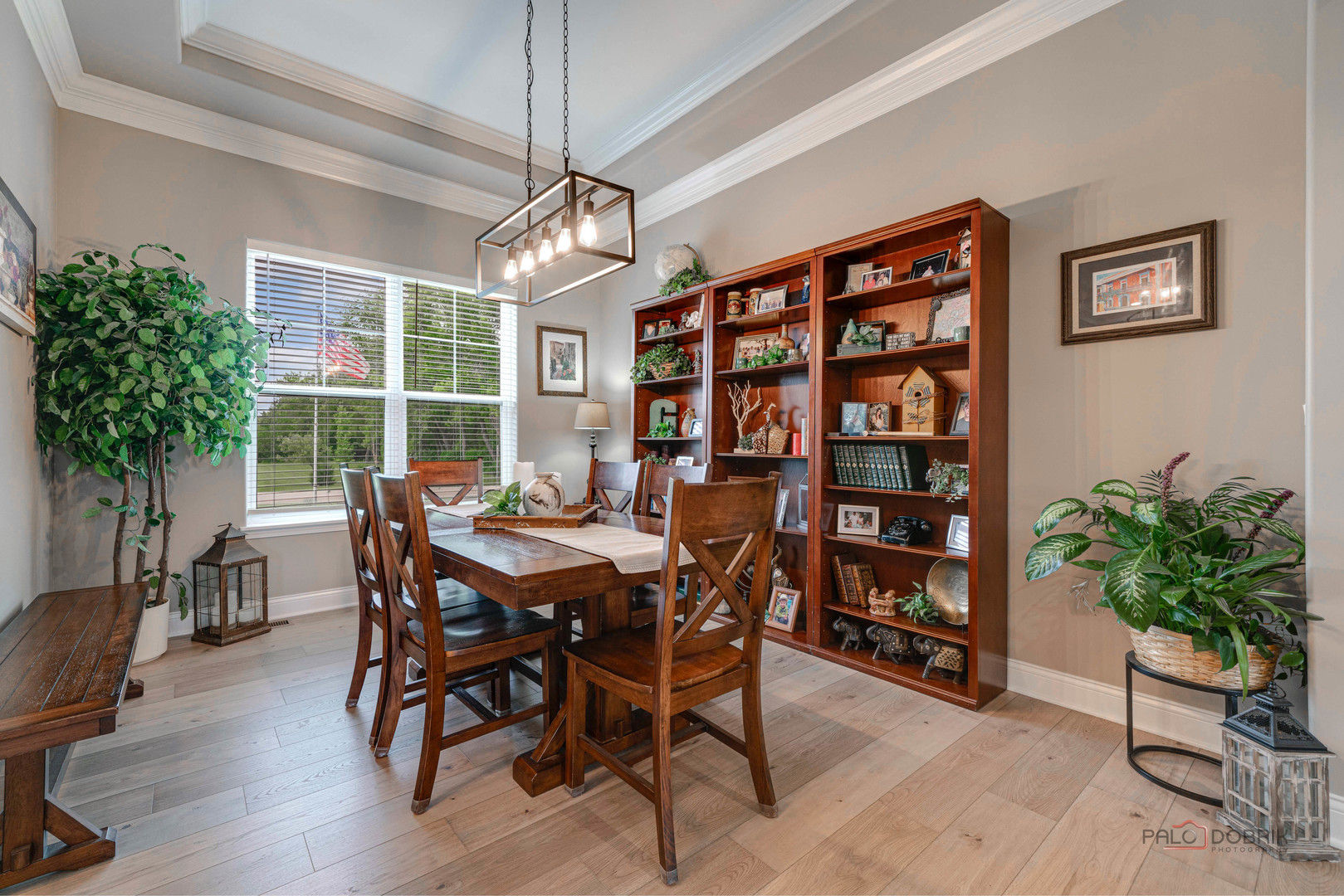 3300 Cornflower Way Spring Grove, IL 60081 - Photo 4 of 34 a view of a dining room with furniture window and wooden floor