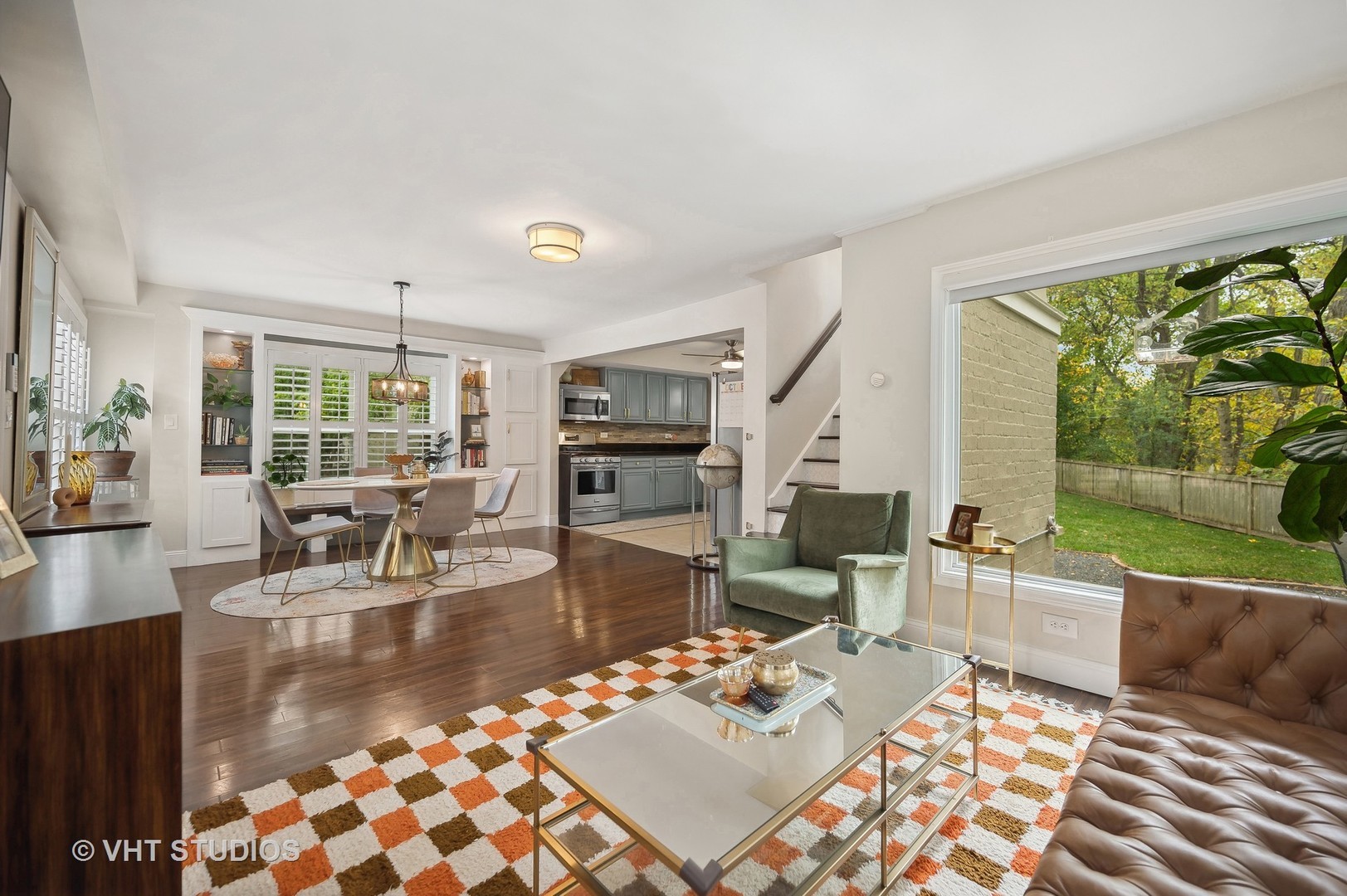 972 Tower Road Winnetka, IL 60093 - Photo 5 of 26 a living room with fireplace furniture and a large window