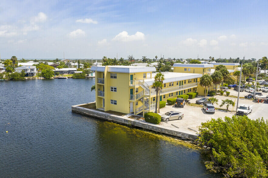 201 Coppitt Road, Unit 104B Key West, FL 33040 - Photo 13 of 13 a view of a lake with a city